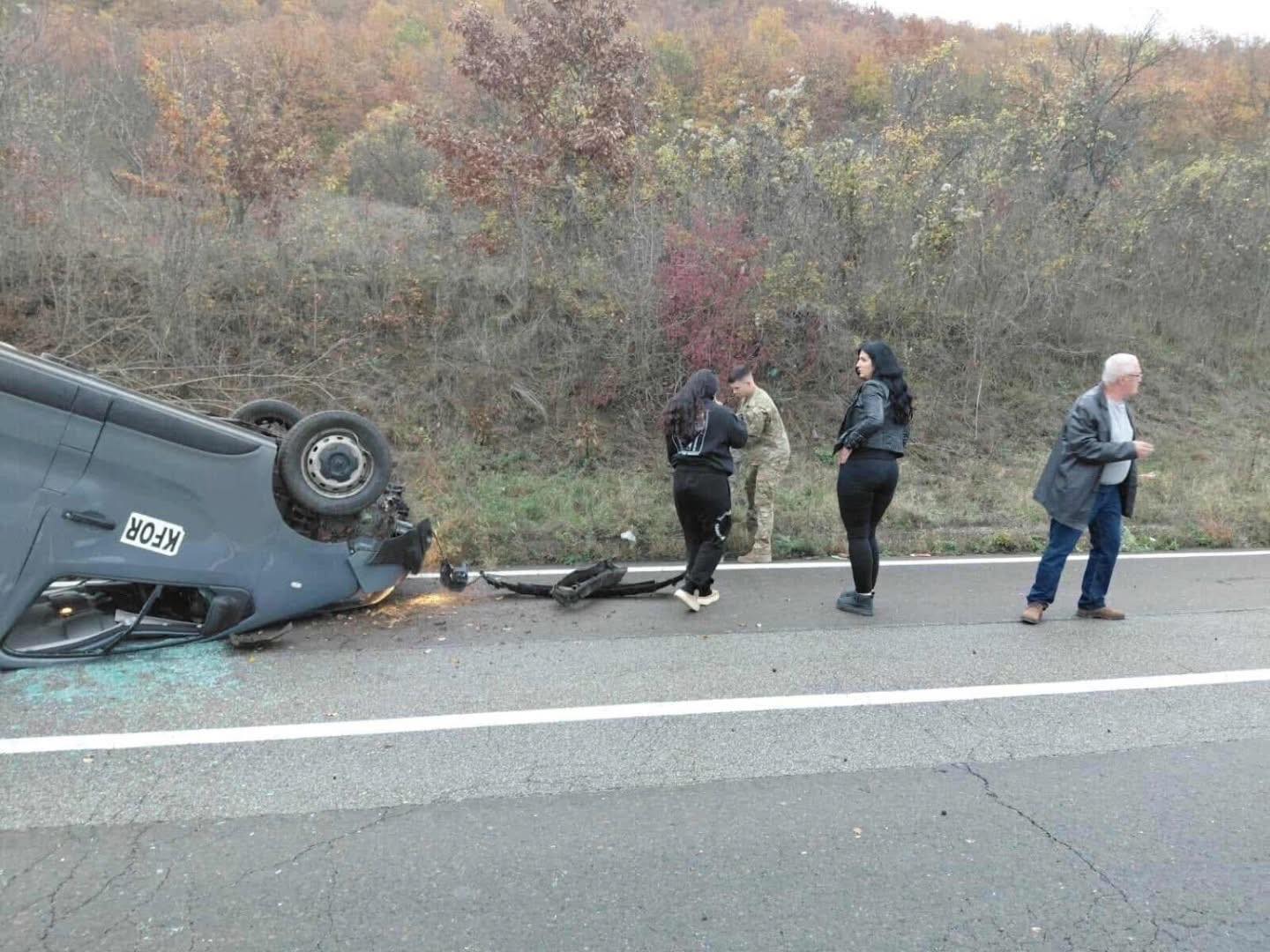 May be an image of car, road and text