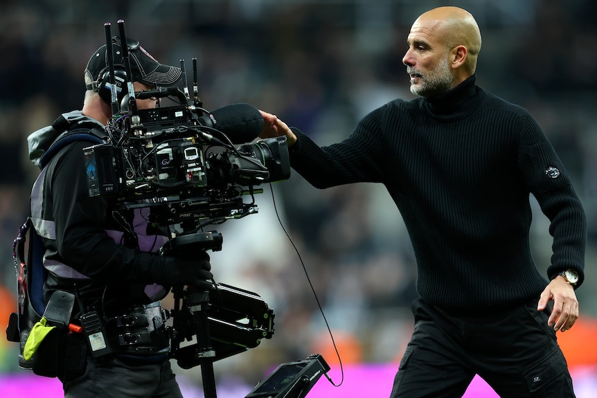 Pep Guardiola apologises to camera operator after confrontation in Manchester City's Premier League loss - ABC News