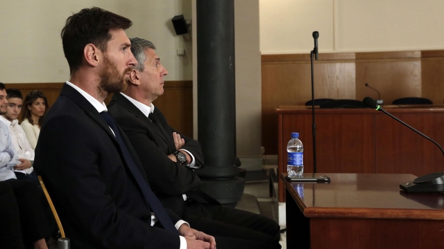 BARCELONA, SPAIN - JUNE 02:  Lionel Messi of FC Barcelona and his father Jorge Horacio Messi seen inside the court during the third day of the trial on June 2, 2016 in Barcelona, Spain. Lionel Messi and his father Jorge Messi, who manages his financial affairs, are accused of defrauding the Spanish Tax Agency of 4.1 million Euros ($4.6 million, £3.2 million) by using companies based in tax havens such as Belize and Uruguay to conceal earnings from image rights during years 2007 to 2009.  (Photo by Alberto Estevez - Pool/Getty Images)